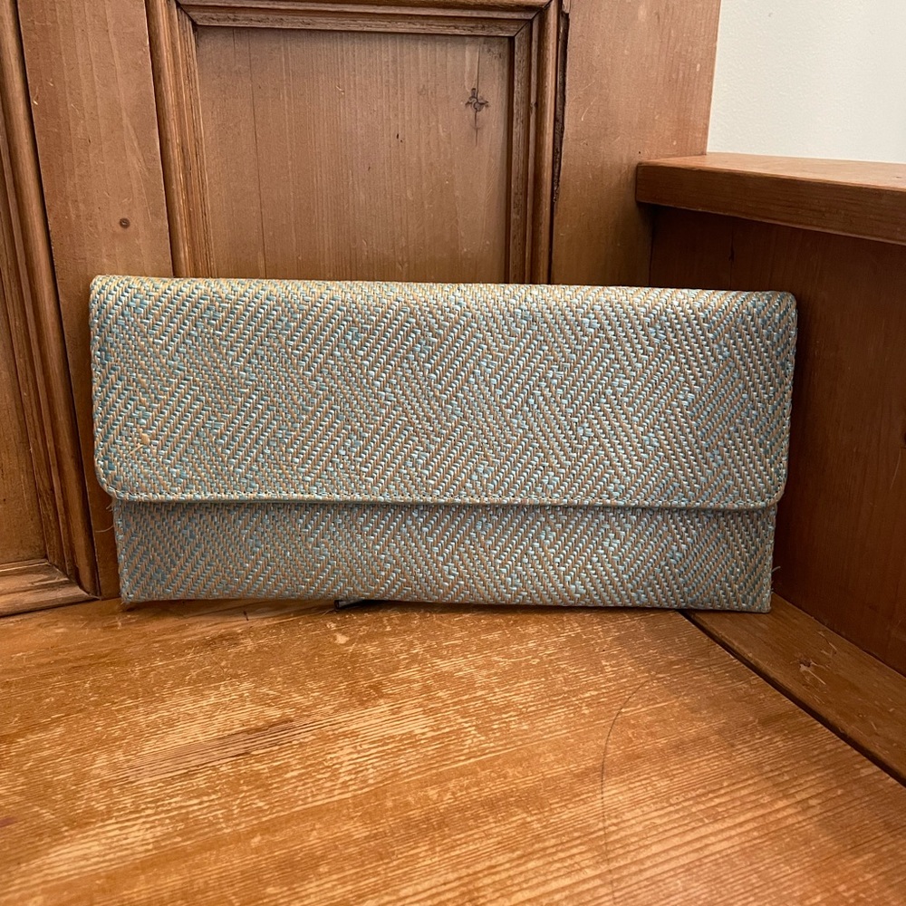 Woven straw seafoam green and natural envelop clutch
